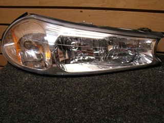 USED FLEETWOOD RV/MOTORHOME RIGHT HAND HEADLIGHT MODEL #: HRA15PP2 97 